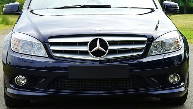 Close-up image of a black Mercedes-Benz showcasing its luxury design